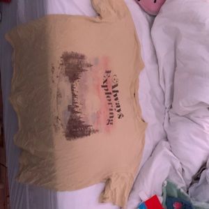 A beautiful baggy tee with “Always exploring” on it!